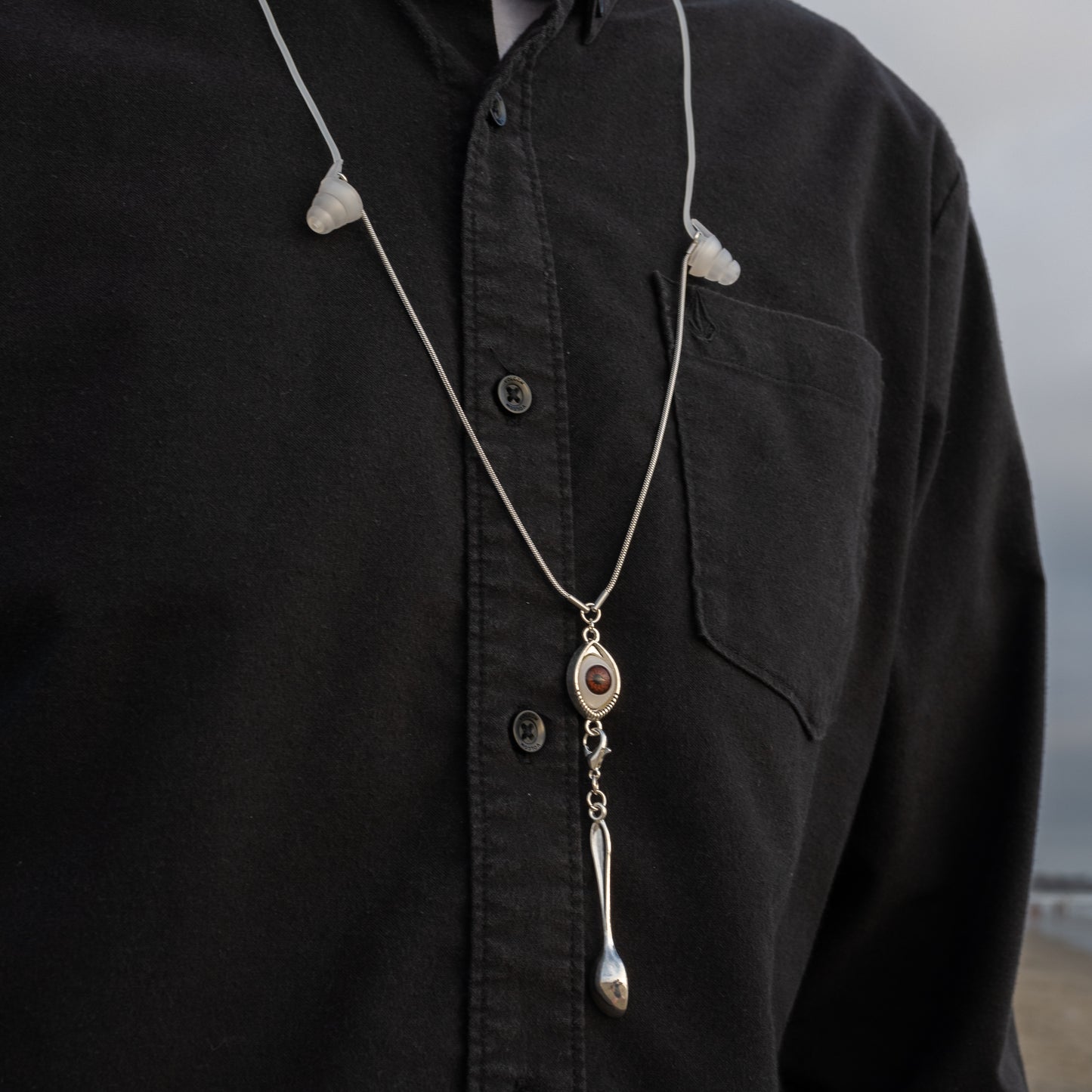evil eye earplug necklace