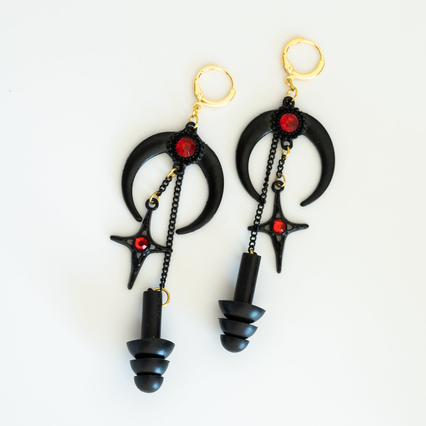 Black star earplug earrings