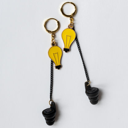 Lightbulb charm noise reducing earplug earring for educators managing noisy classroom environments