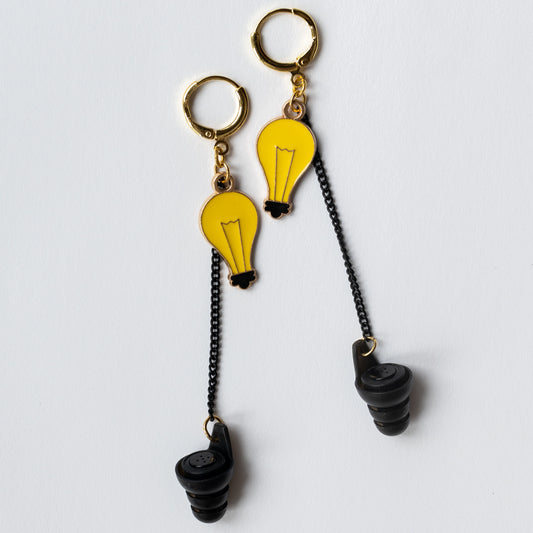 Lightbulb charm noise reducing earplug earring for educators managing noisy classroom environments