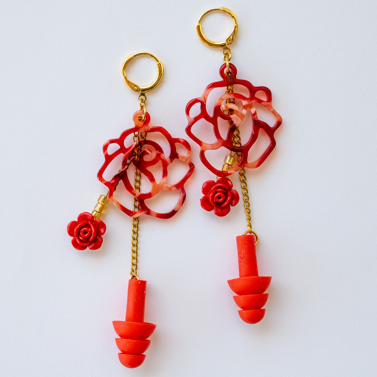 earplug earrings for music festival fashion featuring beaded red rose design