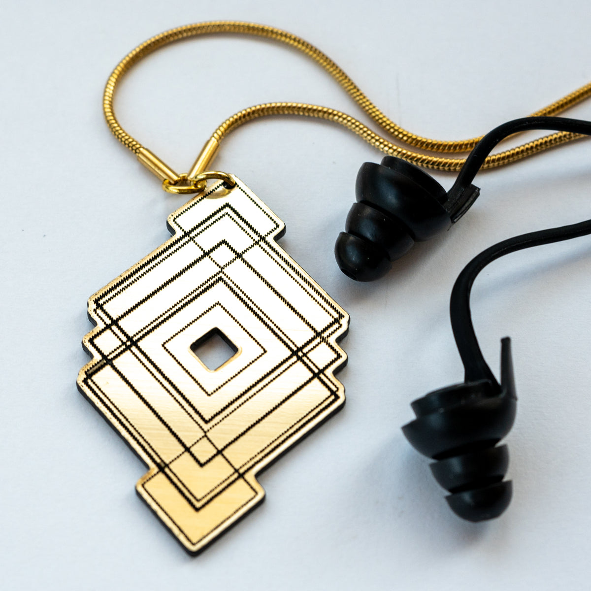 gold reflective earplug necklace